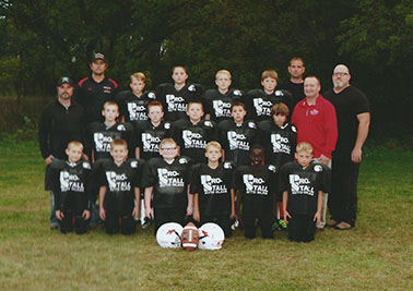 A group of young men standing next to each other.